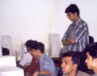 [Photo of Satya at website design contest]